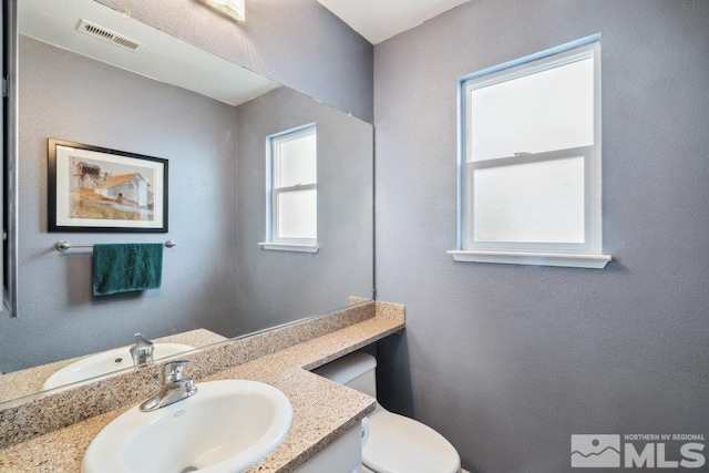 2190 Canyon Mesa Ct, Reno, NV 89523 - half bathroom with toilet and vanity