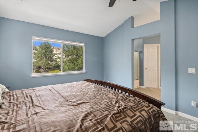 2190 Canyon Mesa Ct, Reno, NV 89523 - carpeted bedroom with vaulted ceiling, baseboards, and a ceiling fan