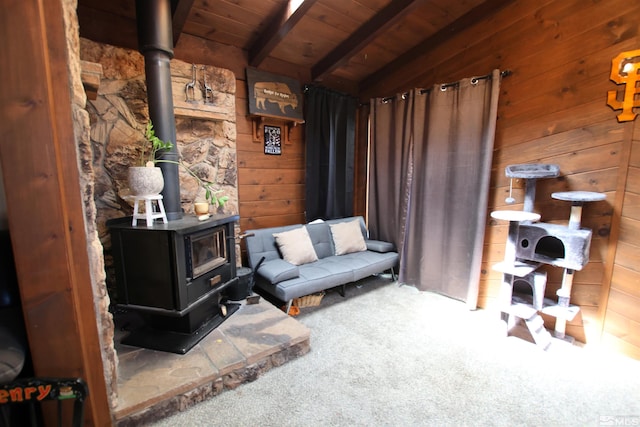 435 Shipley Dr, Yerington, NV 89447 - sitting room featuring carpet, a wood stove, wooden walls, and wooden ceiling