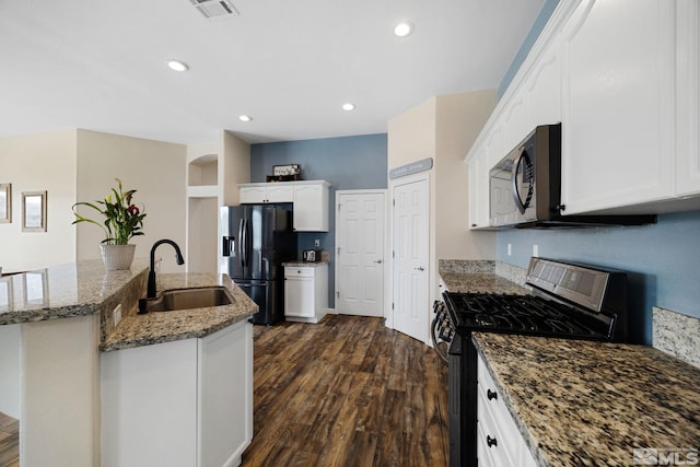 1523 Riverpark Pkwy, Dayton, NV 89403 - kitchen featuring black appliances, a sink, dark wood-style floors, white cabinetry, and recessed lighting