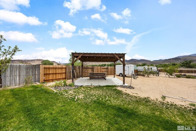 1523 Riverpark Pkwy, Dayton, NV 89403 - view of yard with a mountain view, a patio area, and a pergola