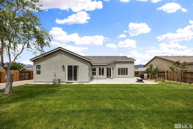 1523 Riverpark Pkwy, Dayton, NV 89403 - back of property featuring a patio area, stucco siding, and cooling unit