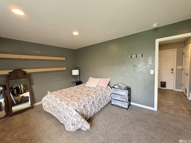 660 Castle Way, Winnemucca, NV 89445 - bedroom with carpet flooring, baseboards, and recessed lighting