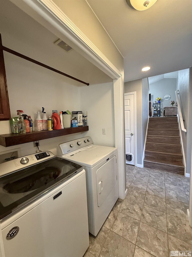 660 Castle Way, Winnemucca, NV 89445 - laundry room featuring independent washer and dryer, baseboards, and light stone finish floors