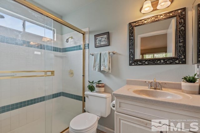 1940 Peavine Rd, Reno, NV 89503 - bathroom featuring a shower stall, toilet, and vanity