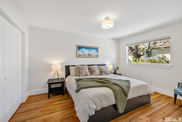 2480 Idlewild Dr, Reno, NV 89509 - bedroom featuring baseboards, light wood finished floors, and a closet