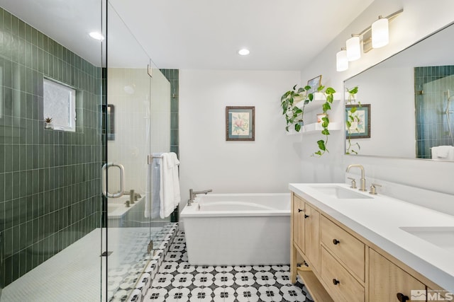 2480 Idlewild Dr, Reno, NV 89509 - full bath with a bathtub, a shower stall, double vanity, and recessed lighting