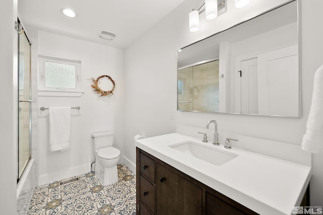 2480 Idlewild Dr, Reno, NV 89509 - bathroom with baseboards, toilet, vanity, recessed lighting, and combined bath / shower with glass door