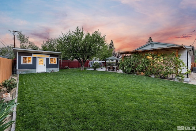 2480 Idlewild Dr, Reno, NV 89509 - yard at dusk with a patio and a gazebo