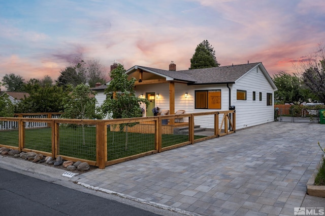 2480 Idlewild Dr, Reno, NV 89509 - view of front facade with a chimney