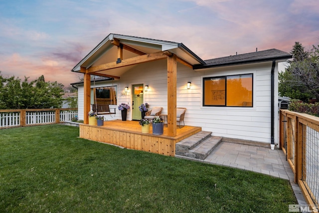 2480 Idlewild Dr, Reno, NV 89509 - back of property at dusk with a wooden deck