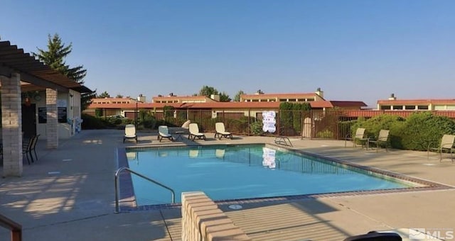 3425 Skyline Blvd, Reno, NV 89509 - community pool featuring a patio area and fence