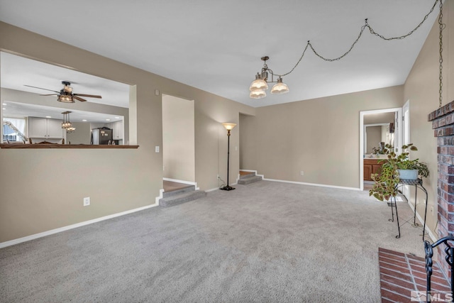5245 Canyon View Dr, Sparks, NV 89436 - unfurnished living room with baseboards, a chandelier, carpet floors, and ceiling fan