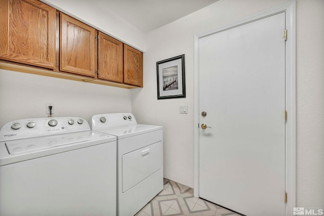 5245 Canyon View Dr, Sparks, NV 89436 - clothes washing area with independent washer and dryer and cabinet space