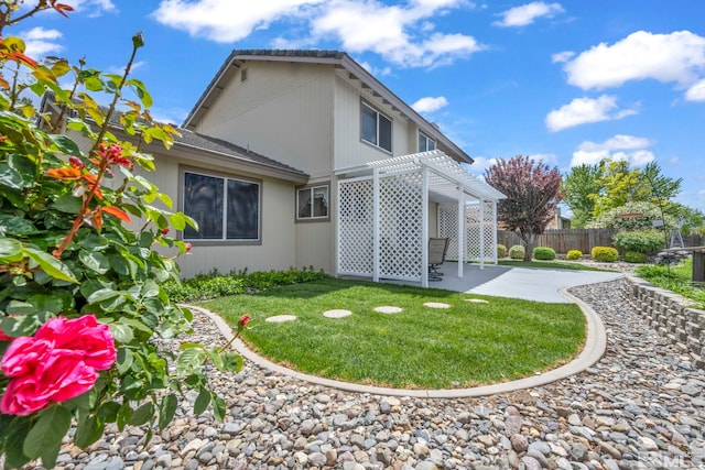 5245 Canyon View Dr, Sparks, NV 89436 - back of property with a pergola and a patio area
