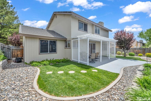 5245 Canyon View Dr, Sparks, NV 89436 - back of property featuring a pergola, a patio area, and a chimney