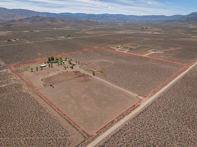 4800 Amy Rd, Reno, NV 89510 - aerial view of sparsely populated area with property parcel outlined and a mountainous background