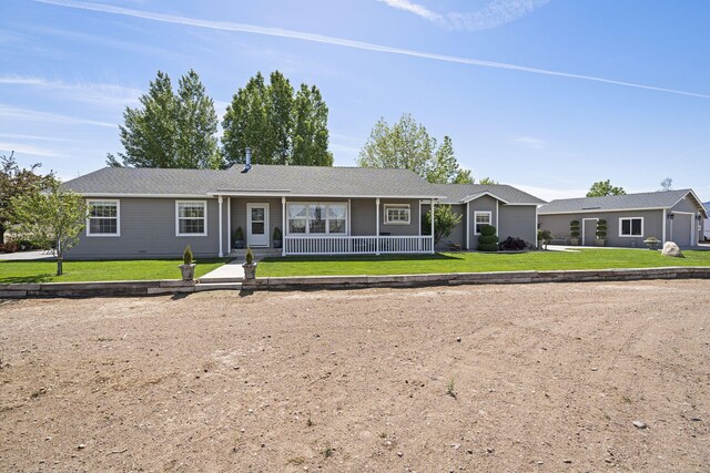 4800 Amy Rd, Reno, NV 89510 - ranch-style house with a porch and a front yard