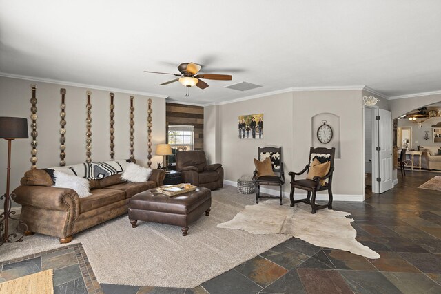 4800 Amy Rd, Reno, NV 89510 - living area with a ceiling fan, arched walkways, stone tile floors, ornamental molding, and baseboards