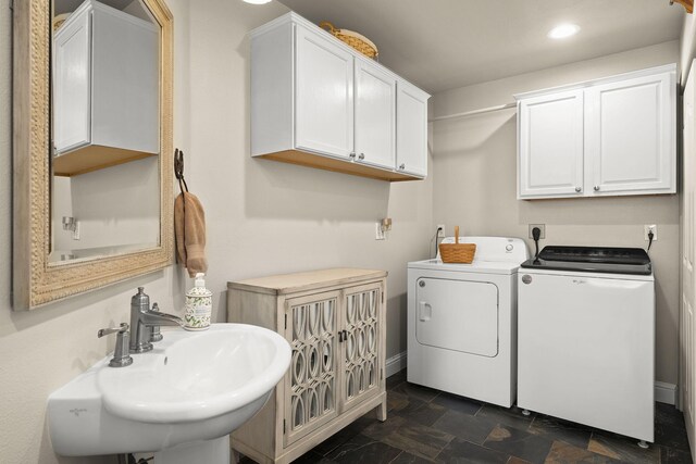 4800 Amy Rd, Reno, NV 89510 - clothes washing area featuring washing machine and dryer, dark stone finish floors, recessed lighting, and baseboards