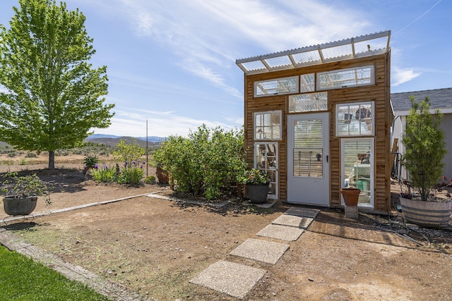 4800 Amy Rd, Reno, NV 89510 - view of exterior entry featuring a mountain view