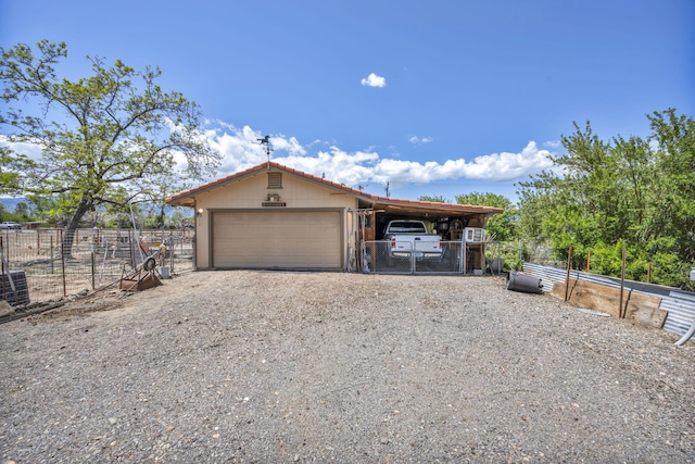 1000 Sagebrush Ct, Gardnerville, NV 89460 - view of front of property with fence and gravel driveway