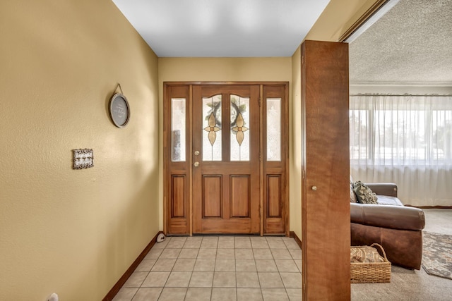 1000 Sagebrush Ct, Gardnerville, NV 89460 - entryway featuring plenty of natural light, baseboards, and light tile patterned floors
