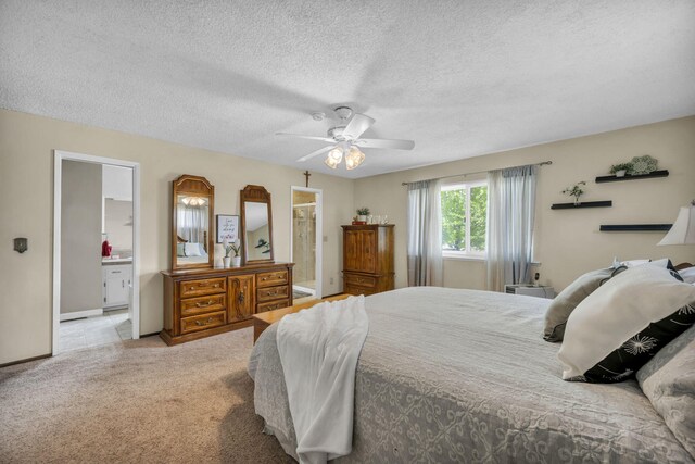1000 Sagebrush Ct, Gardnerville, NV 89460 - bedroom featuring connected bathroom, a textured ceiling, carpet floors, and ceiling fan