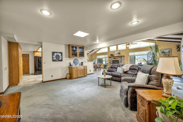 1000 Sagebrush Ct, Gardnerville, NV 89460 - living area featuring ceiling fan, baseboards, a fireplace, light colored carpet, and recessed lighting