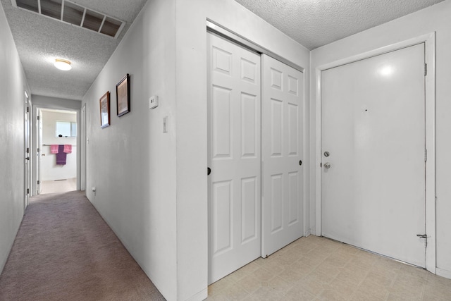 295 Andrew Ln, Reno, NV 89521 - corridor featuring a textured ceiling