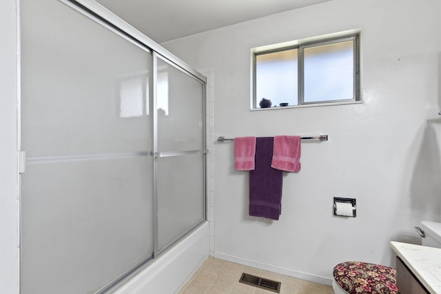 295 Andrew Ln, Reno, NV 89521 - full bathroom featuring toilet, vanity, baseboards, and enclosed tub / shower combo