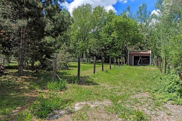 295 Andrew Ln, Reno, NV 89521 - view of yard featuring an outdoor structure