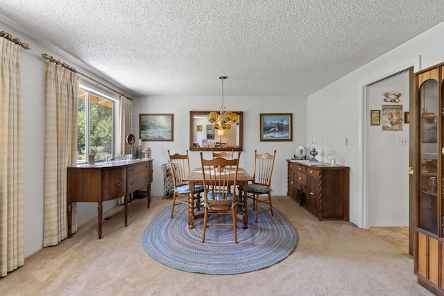 295 Andrew Ln, Reno, NV 89521 - dining space featuring light colored carpet, a chandelier, and a textured ceiling