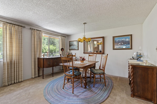 295 Andrew Ln, Reno, NV 89521 - dining space featuring light carpet, a chandelier, and a textured ceiling