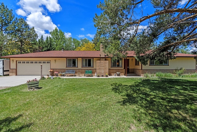 295 Andrew Ln, Reno, NV 89521 - ranch-style home featuring an attached garage, concrete driveway, brick siding, a chimney, and a front yard