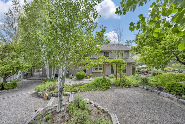 3150 Kings Canyon Rd, Carson City, NV 89703 - view of property hidden behind natural elements featuring a shingled roof