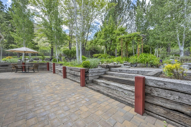 3150 Kings Canyon Rd, Carson City, NV 89703 - view of patio with view of scattered trees and outdoor dining space