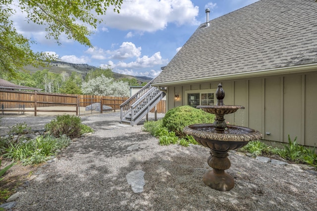 3150 Kings Canyon Rd, Carson City, NV 89703 - view of yard with stairs and a mountain view