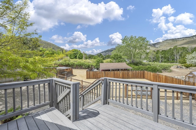 3150 Kings Canyon Rd, Carson City, NV 89703 - wooden terrace with a mountain view and a fenced backyard