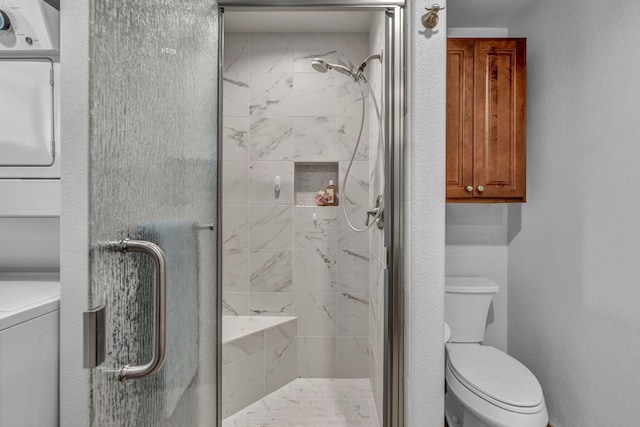 3150 Kings Canyon Rd, Carson City, NV 89703 - full bath featuring a shower stall, toilet, and stacked washer / dryer