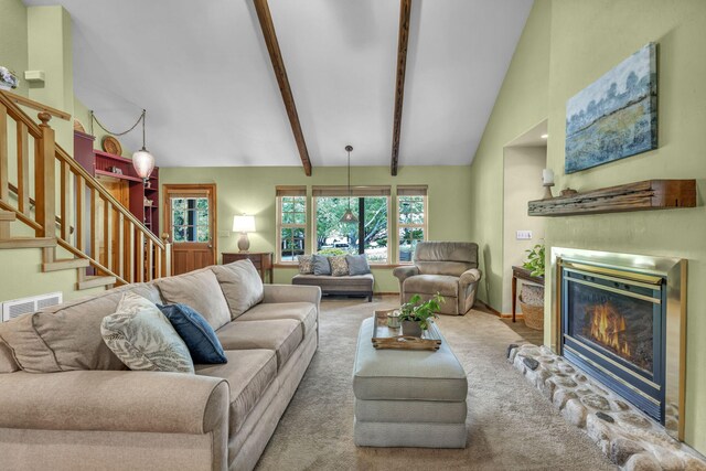3150 Kings Canyon Rd, Carson City, NV 89703 - carpeted living area with a glass covered fireplace and stairs
