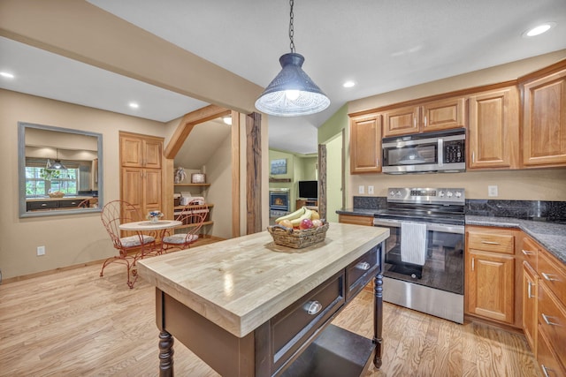 3150 Kings Canyon Rd, Carson City, NV 89703 - kitchen featuring stainless steel appliances, light wood-type flooring, hanging light fixtures, recessed lighting, and wood counters
