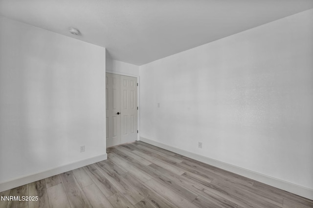 185 Windtree Cir, Carson City, NV 89701 - empty room featuring wood finished floors, baseboards, and a smoke detector