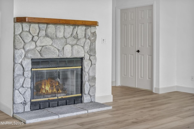 185 Windtree Cir, Carson City, NV 89701 - detailed view of wood finished floors, a fireplace, and baseboards