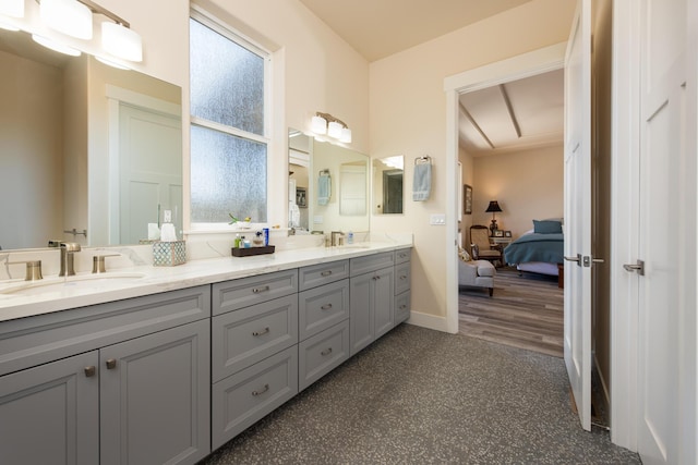 1023 Sun Crest Ct, Gardnerville, NV 89460 - ensuite bathroom featuring double vanity and baseboards