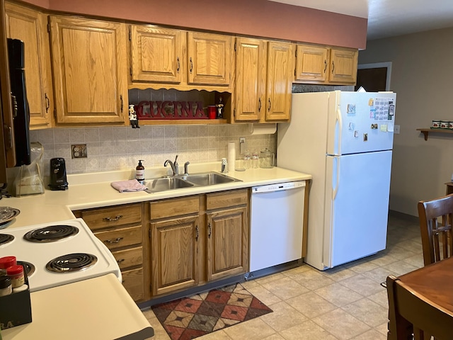 3260 Lucerne Way, Sparks, NV 89431 - kitchen with white appliances, a sink, light countertops, and decorative backsplash