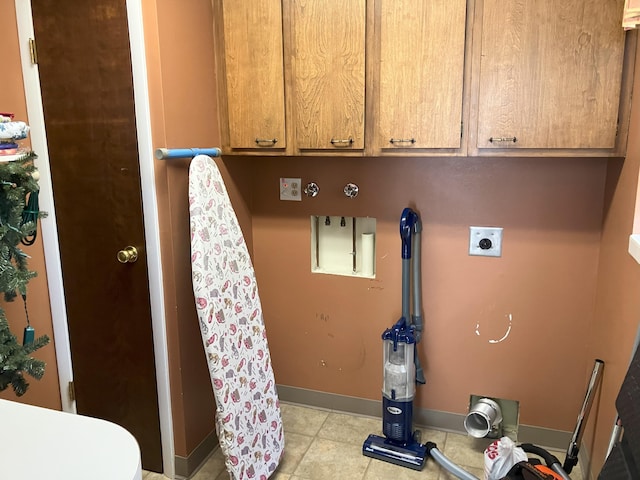 3260 Lucerne Way, Sparks, NV 89431 - clothes washing area featuring electric dryer hookup, cabinet space, and baseboards