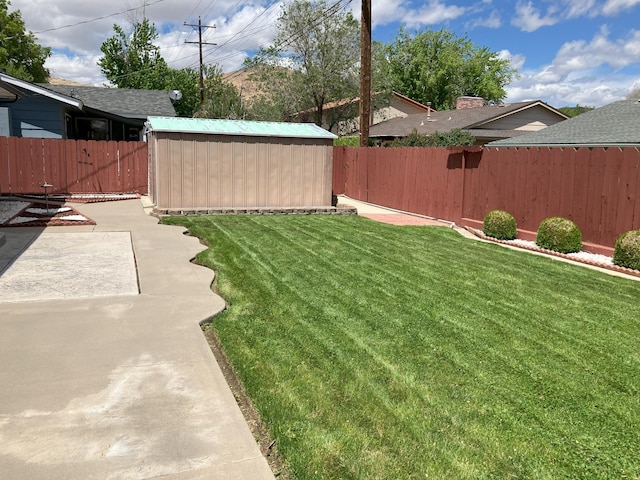 3260 Lucerne Way, Sparks, NV 89431 - view of yard featuring an outdoor structure, a storage unit, and a patio area