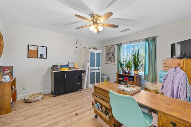 1390 Tule Peak Cir, Carson City, NV 89701 - home office featuring ceiling fan, light wood-style flooring, and baseboards