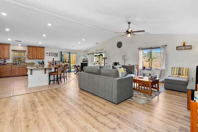 1390 Tule Peak Cir, Carson City, NV 89701 - living area with light wood-style floors, ceiling fan, lofted ceiling, and recessed lighting